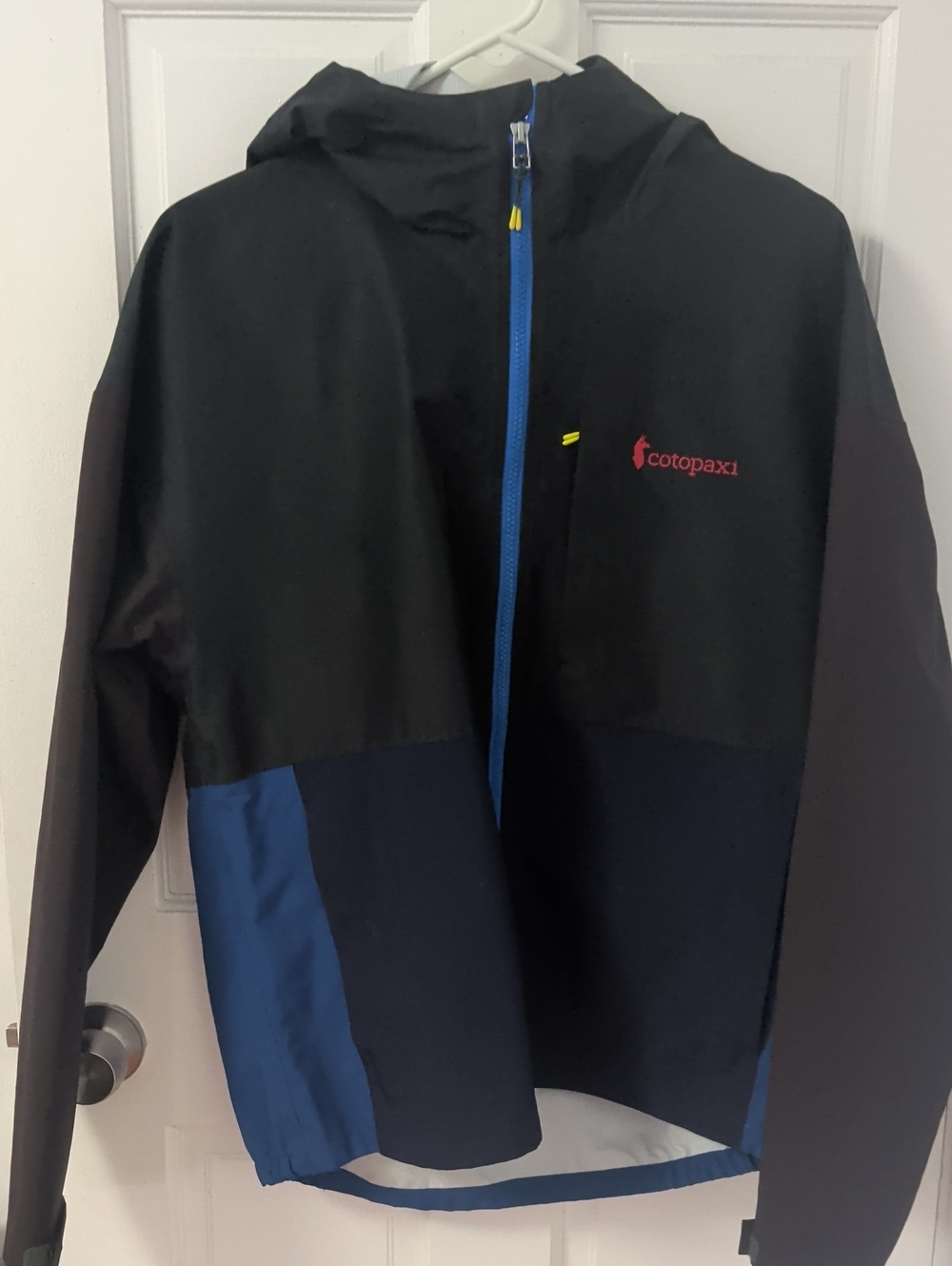 cotopaxi Black & Navy Hooded Windbreaker with Blue Zipper
